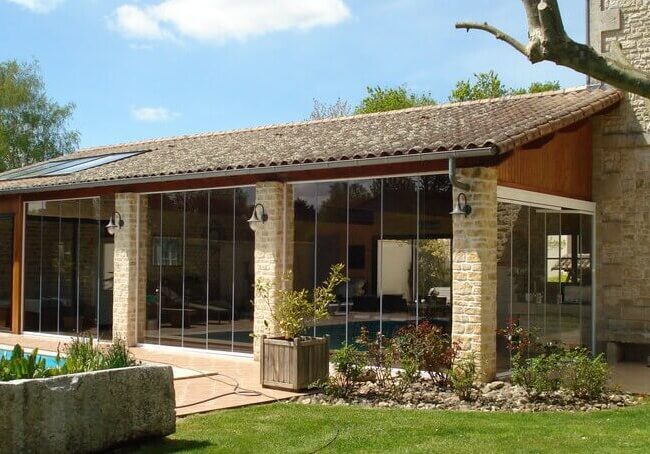 Véranda Extension Pergola Carport et Menuiserie à Royan Bordeaux St Jean d'Angely Limoges Poitiers Cognac Périgueux La Rochelle